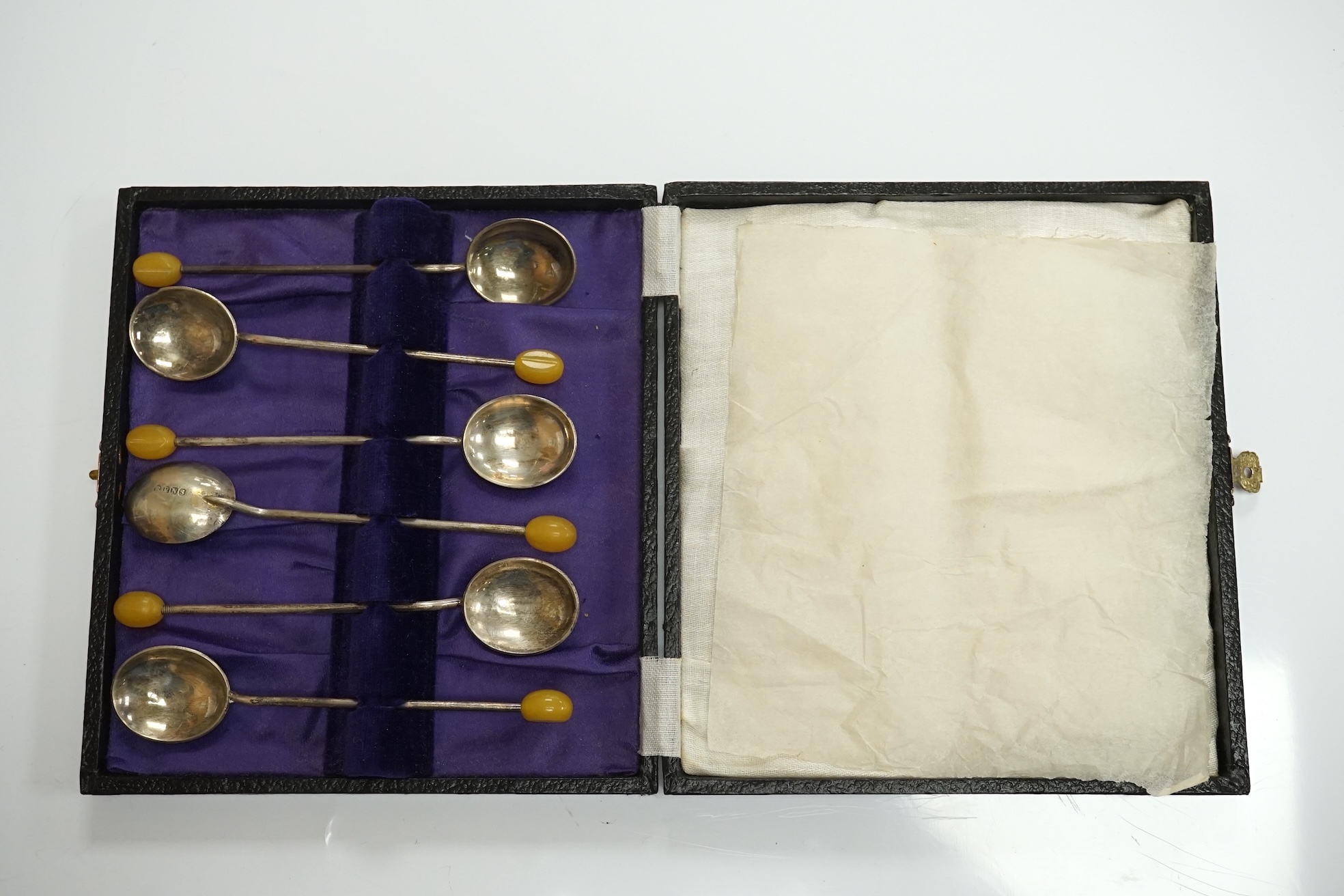 An Elizabeth II silver quatrefoil dish by James Dixon & Sons, Sheffield, 1967, 14.2cm, together with a silver spoon and pusher, silver bonbon dish, pair of silver wishbone nips and a cased set of plated spoons. Condition